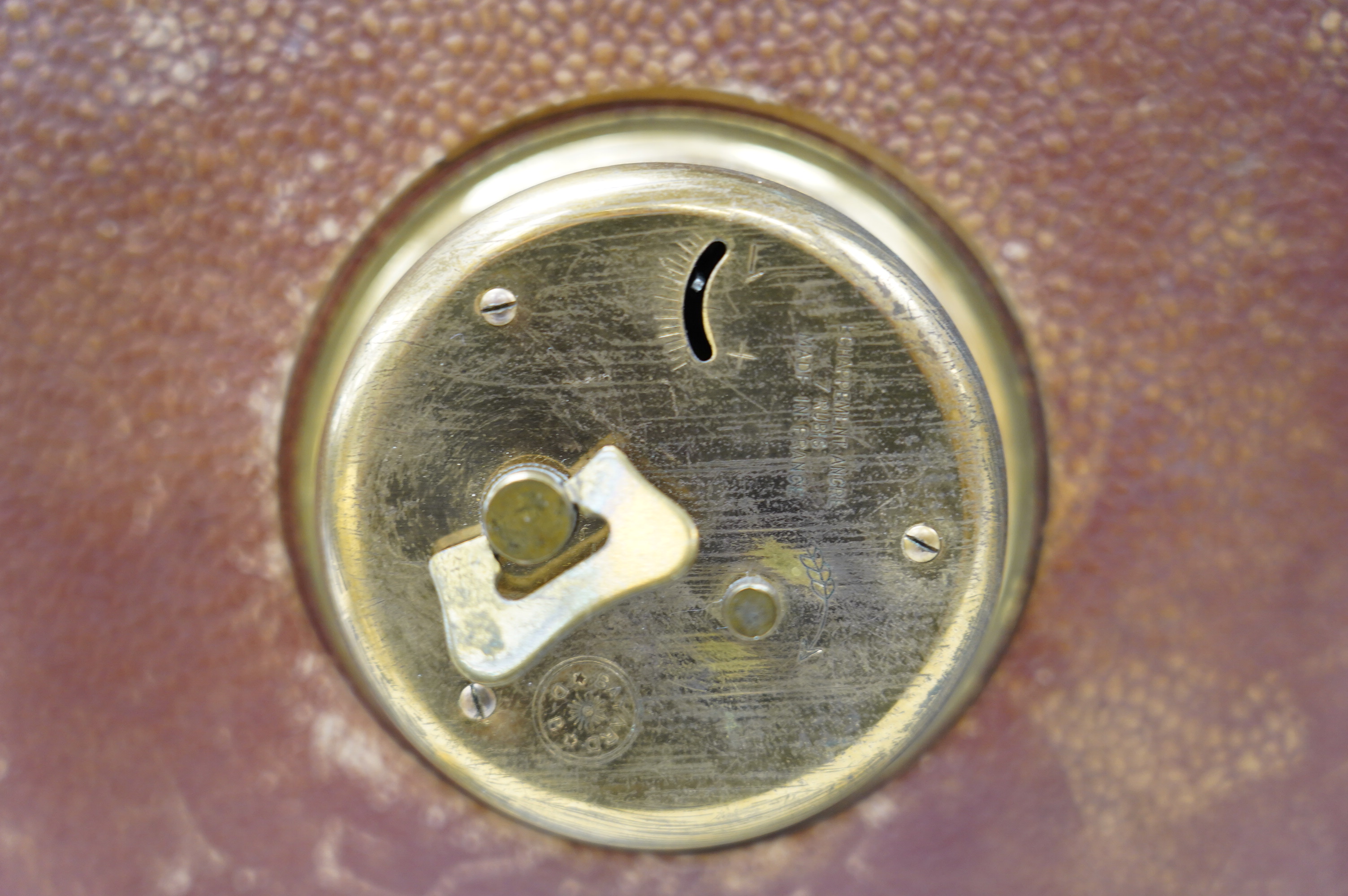 A leather Hermes style Bayard clock in a faux shagreen patina